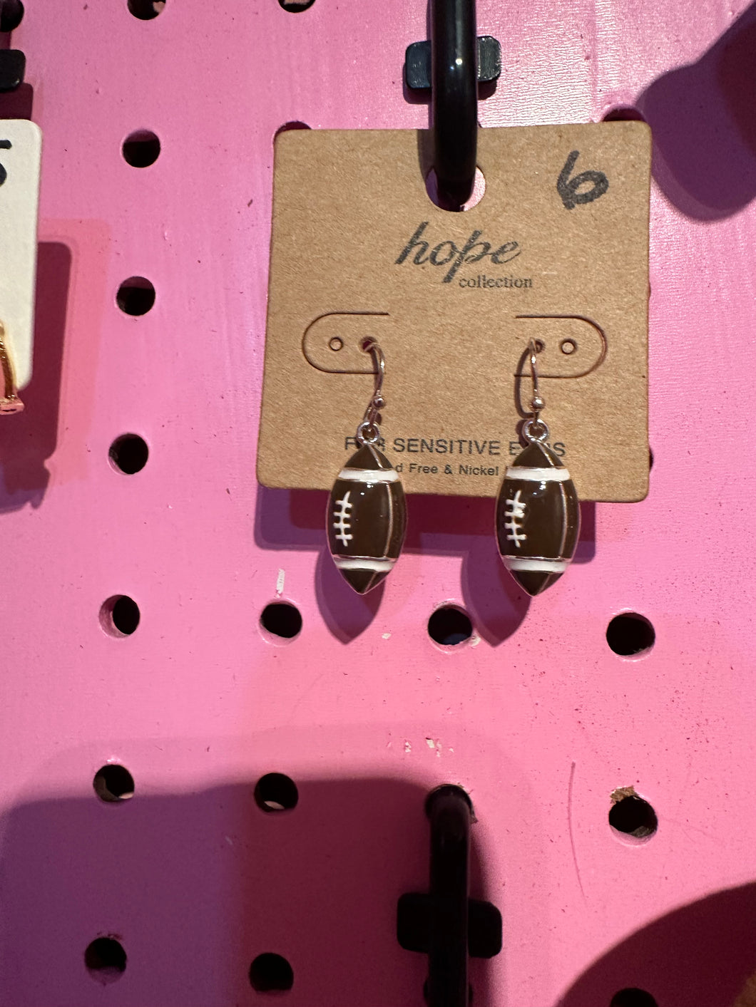 Football dangle earrings